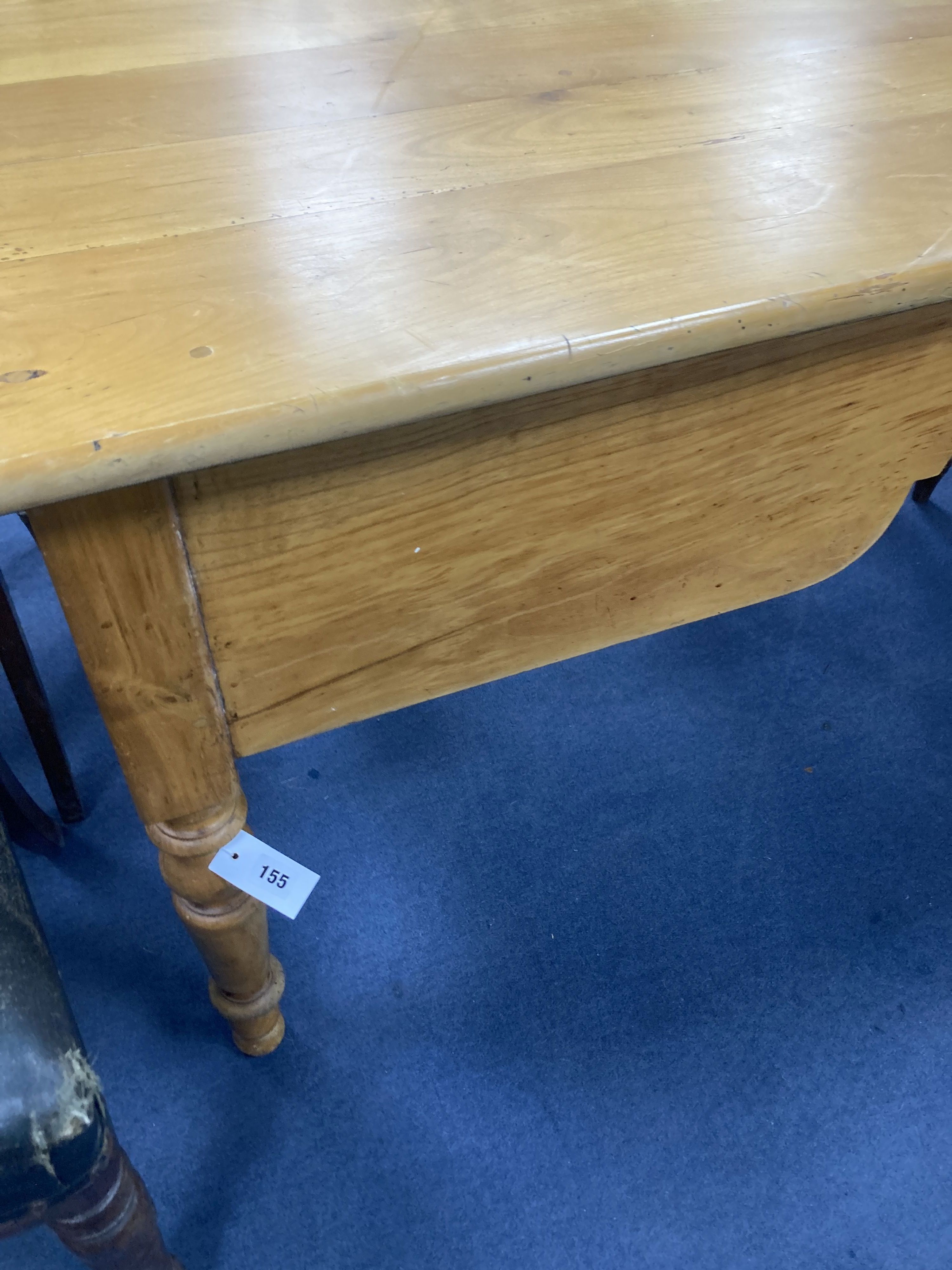 A 19th century French walnut farmhouse table, fitted with one deep and one shallow frieze drawer, length 208cm, depth 76cm, height 75cm